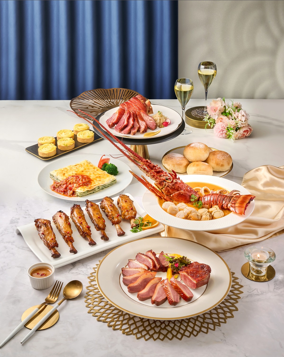 西式年菜「祥龍迎春年菜宴」中有「王品嚴選龍蝦海鮮番茄湯」等7道料理，售價4,999元。